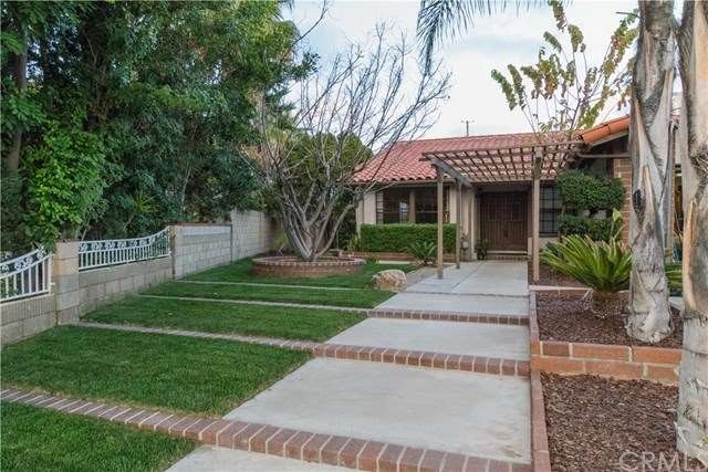 BEAUTIFULLY MANICURED FRONT YARD
