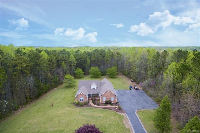 Perfect country living on 10 scenic, private acres. Paved driveway and 2-car garage....Horses allowed per Restrictive Covenants!