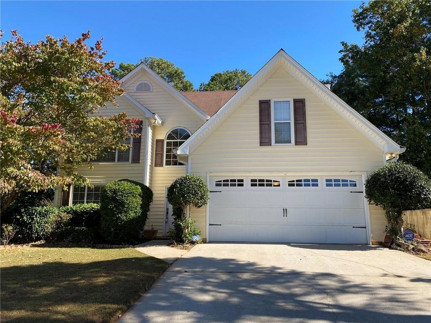 View of front of home featuring a garage