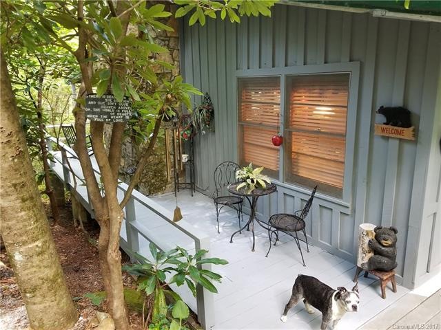 One side of three sided deck of the house from par