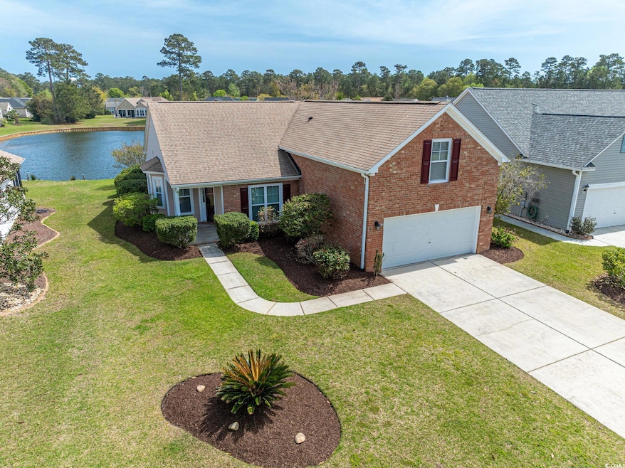 View of front of home featuring concrete driveway,