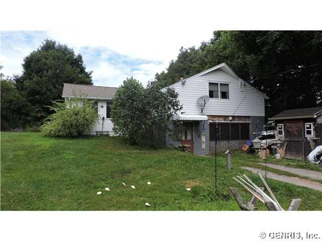 Exterior Front. Newer roof with private 1.92 acres