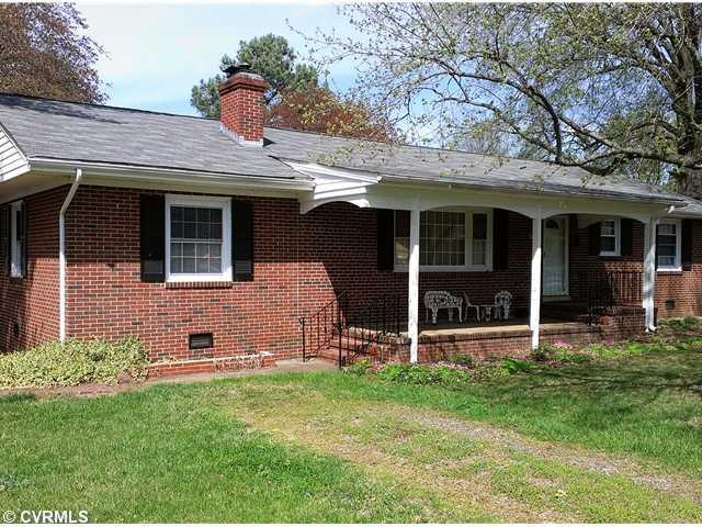 Exterior Front - Great quality brick home with vin