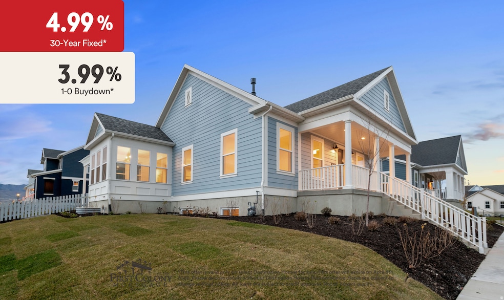 Property exterior at dusk with a shingled roof and stairs
