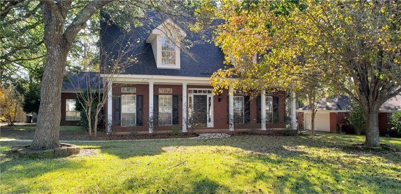 4/2.5 brick home in wonderful subdivision and scho