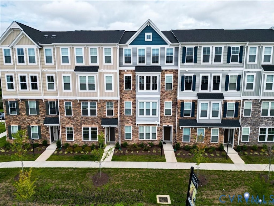 View of front of property featuring a front lawn