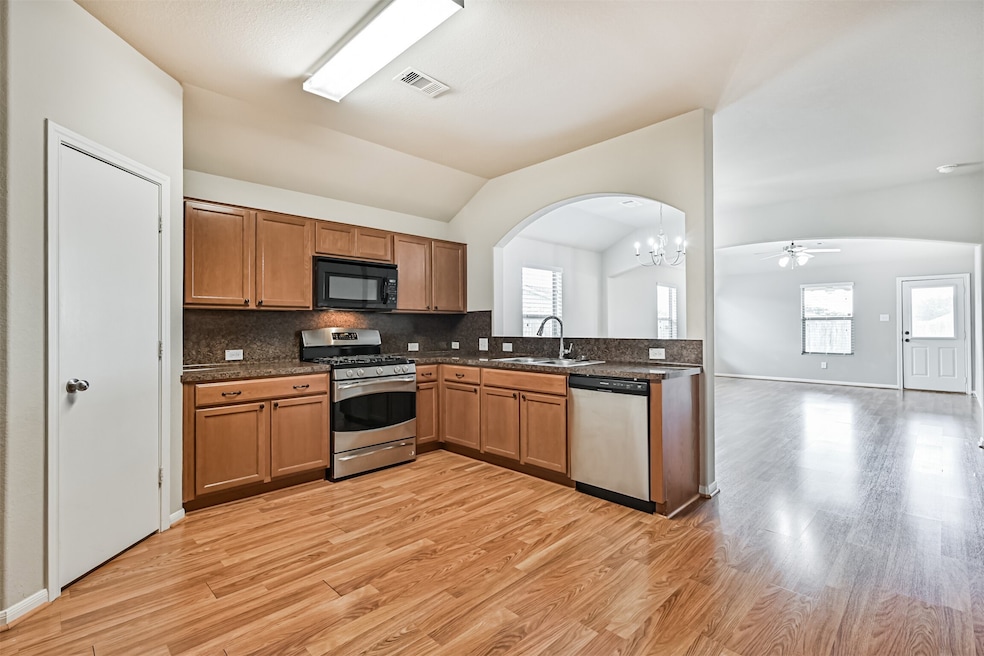 Kitchen with open concept to the dining and living