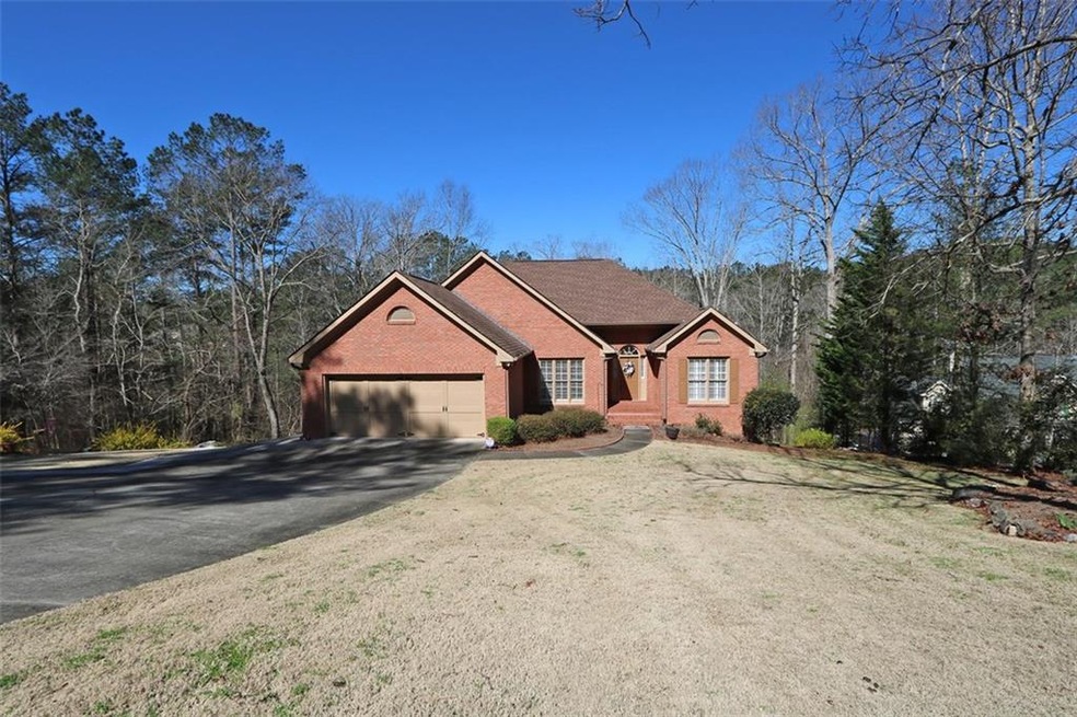 GORGEOUS CUSTOM RANCH NESTLED ON PRIVATE WOODED 1.