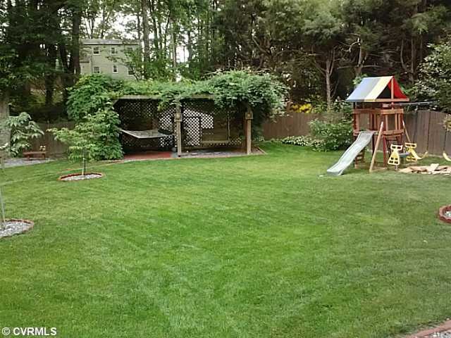 Yard/Garden - gym set conveys Fenced back yard