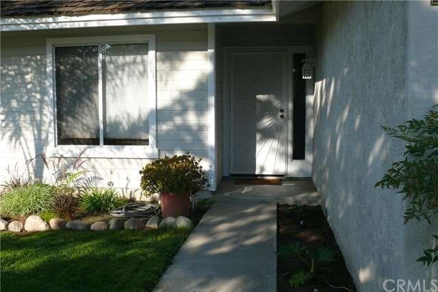 FRONT ENTRANCE AT 308 MONTEGO BAY COURT.  These ph