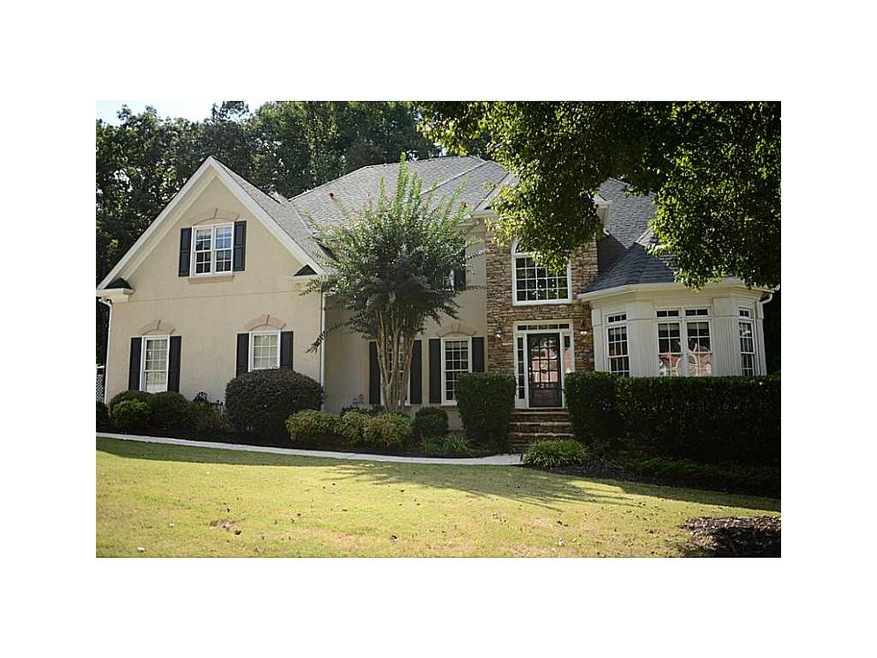 Exterior Front. Large level lot .48 acres with mat