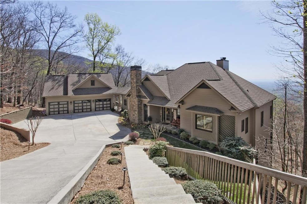 1650 Little Hendricks Mountain Road sits on 1.29 acres and offers long range views including the Atlanta skyline.