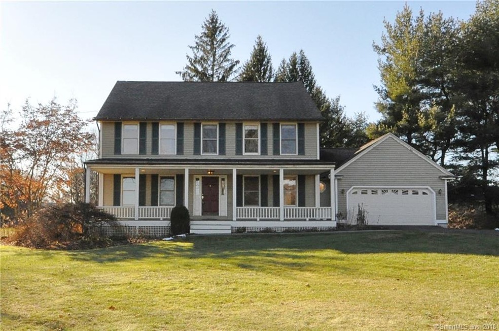 Charming farmhouse colonial with spacious front po