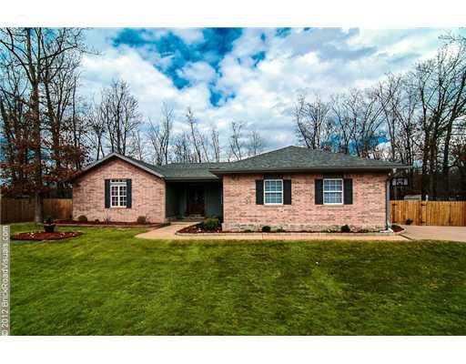 Exterior Front. Fully landscaped exterior with wrap around sidwalk