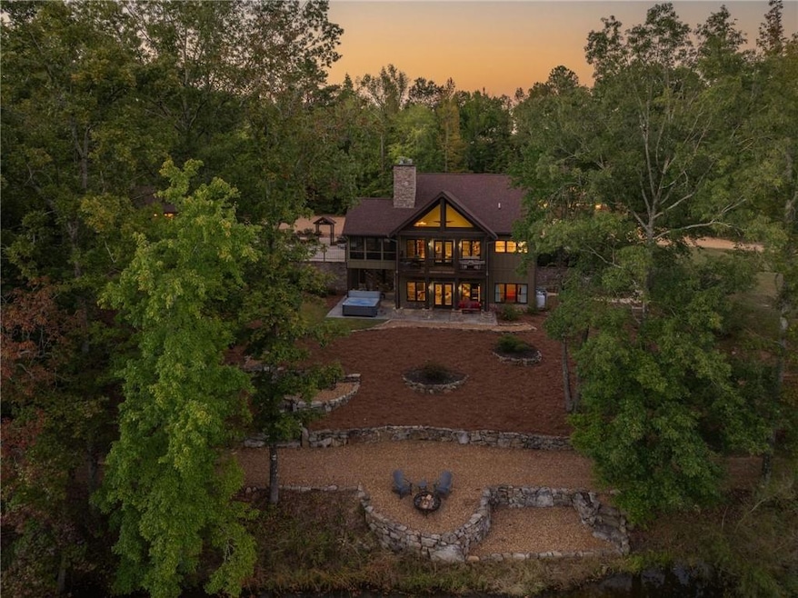 Back of home overlooking the private 4 acre lake, 