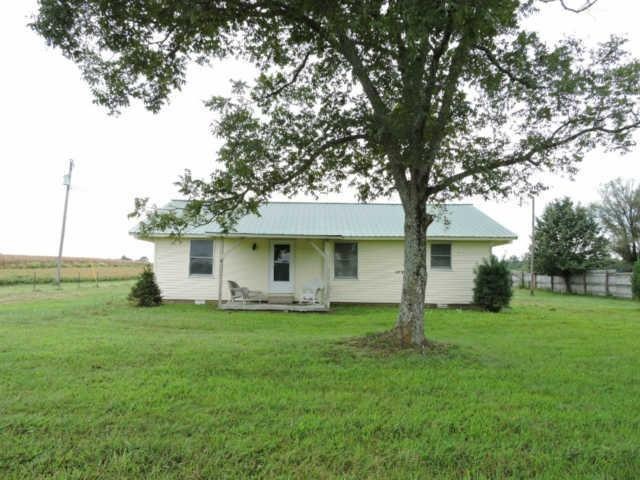 Welcome to 223 Lumley Stand Road, Manchester TN 37355. Home features hardwood flooring, 3 bedrooms, 1 1/2 bathrooms, office ,partial unfinished basement on 5 acres.