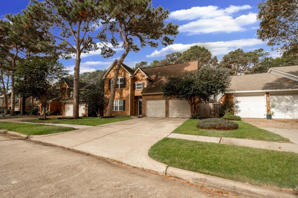 7719 Hidden Oaks Ln, Houston, TX 77095 - photo 1