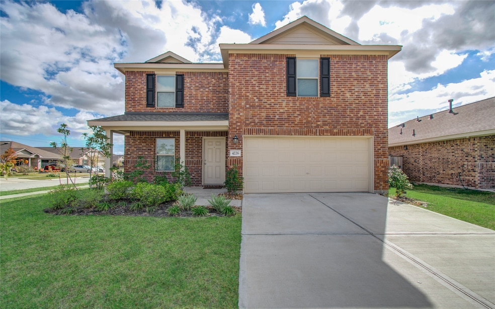 Welcome home! A lovely two-story with a spacious driveway and great curb appeal.