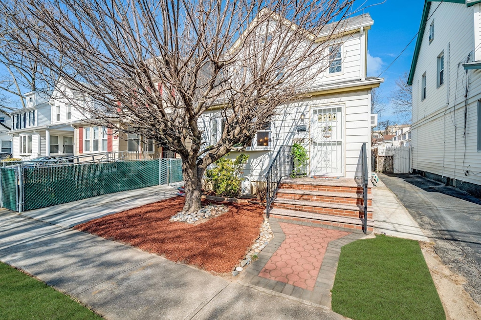 208-11 34th Ave, Bayside, NY 11361 - photo 1