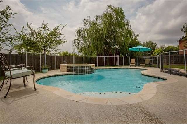 Beautiful in ground heated salt water pool with re