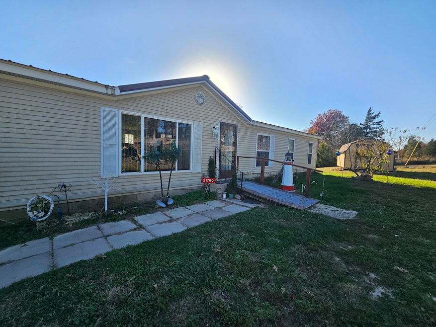 21760 Walnut Rd, Wheatland, MO 65779 - photo 1