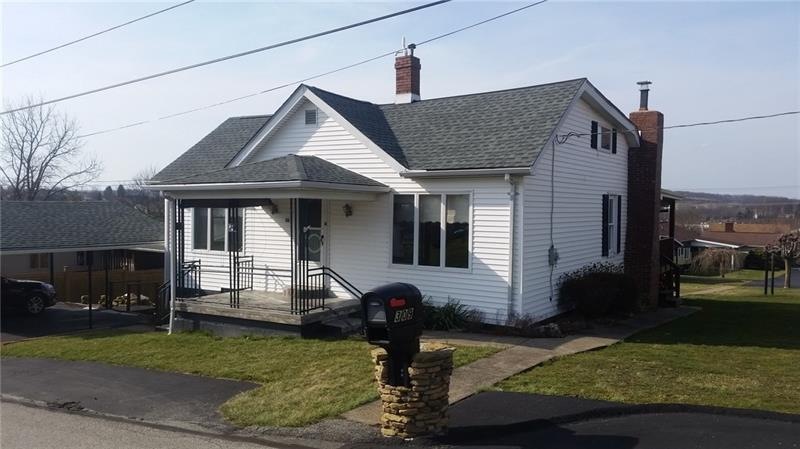 Ranch house with 2 vehicle carport.