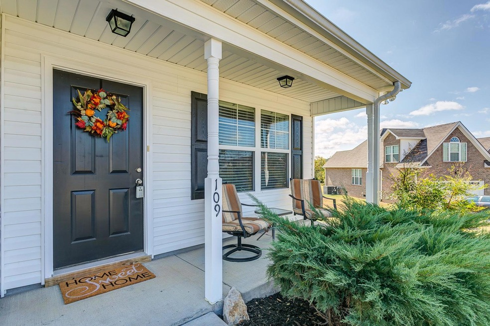 Welcome home!  Inviting covered front porch.