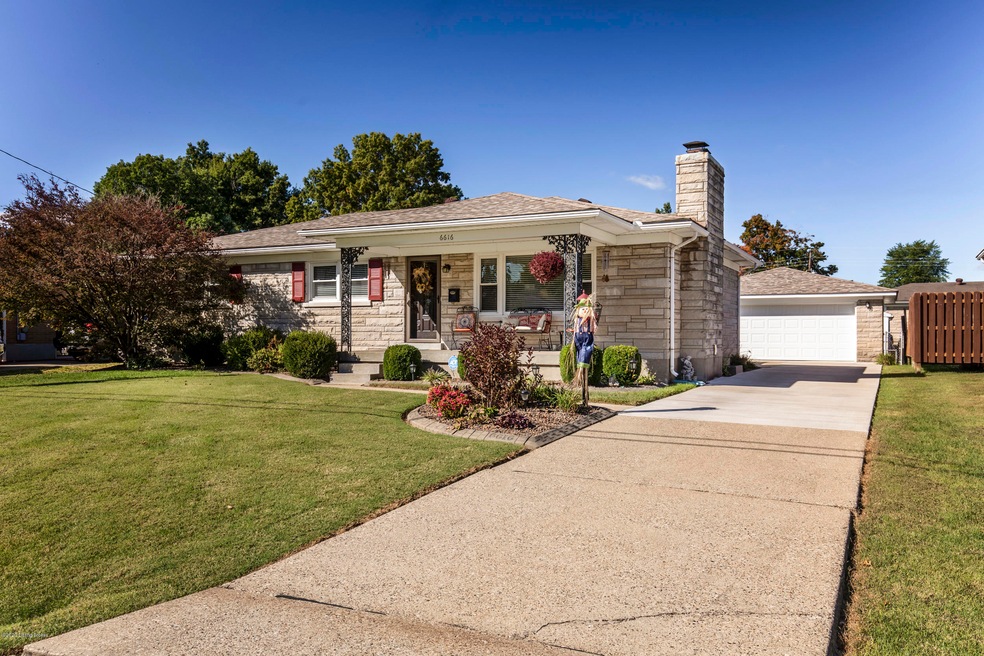GABRIEL FRONT OF HOUSE and garage
