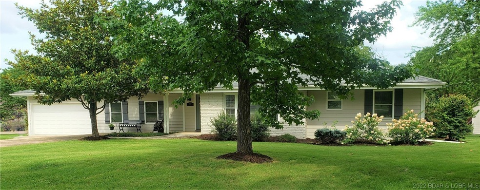 Fantastic curb appeal! Home is encased with hardy