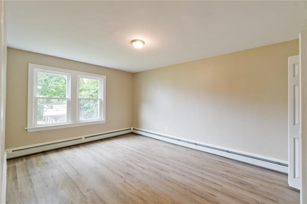 58 Harrison Ave unit 1L, Woonsocket, RI 02895 - photo 1