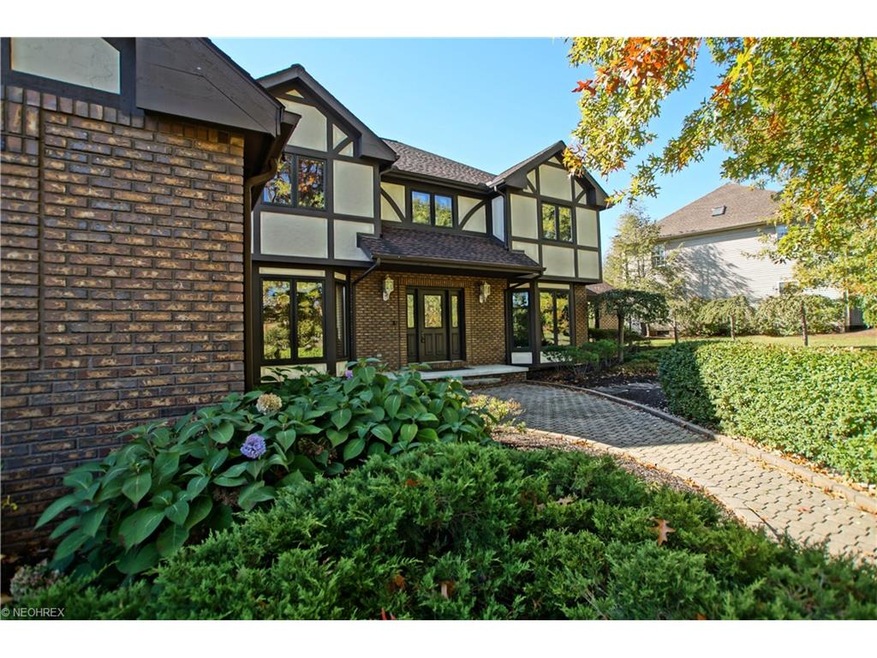 Paver Walkway and Lush Landscaping lead to the fro