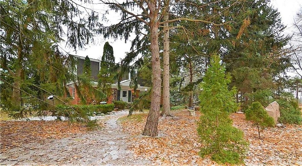 ENCHANTING HOME ON ACREAGE