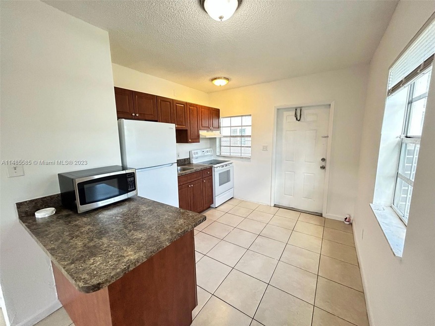 990 Phippen Waiters Rd unit 1, Dania, FL 33004 - photo 1