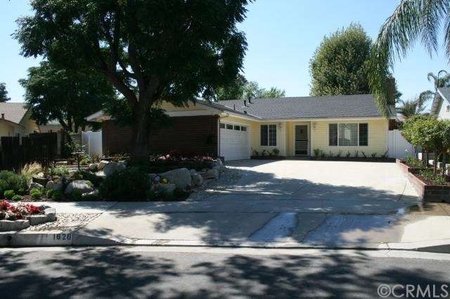 Front View with Fresh New Landscaping and New Viny