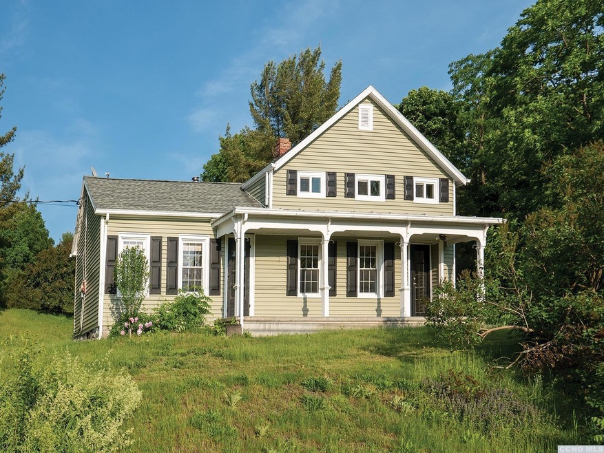 Charming farmhouse set up on a hill