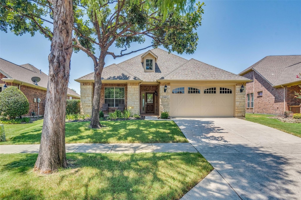 View of front elevation  featuring a garage and a 