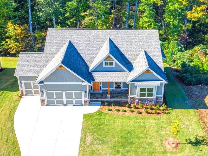 Ranch with full basement and 3 garages
