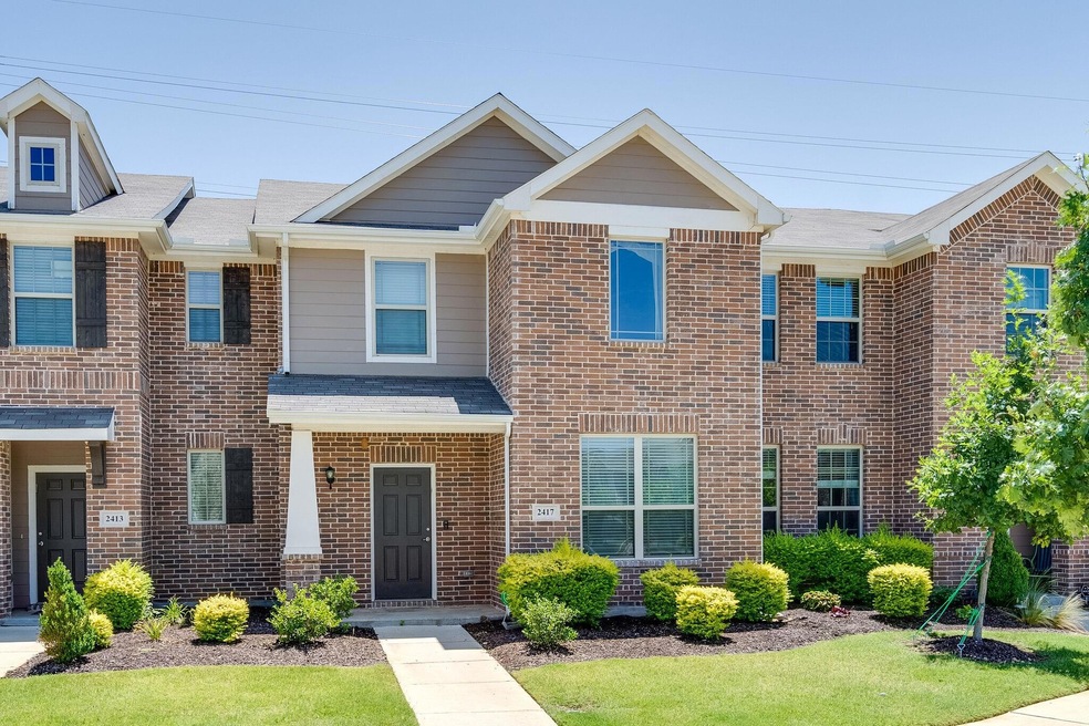 Multi unit property featuring brick siding