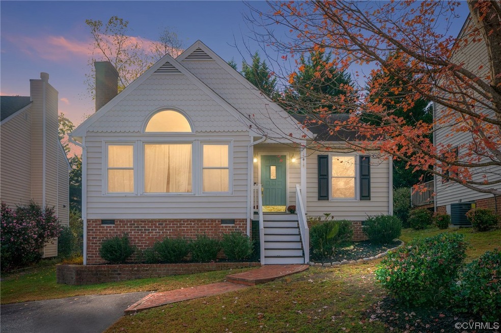 View of front of home featuring central AC unit