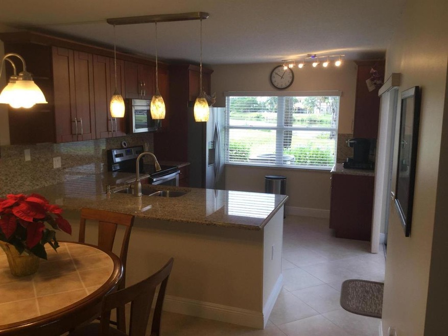 28 Clinton Ct unit D, Royal Palm Beach, FL 33411 - photo 1