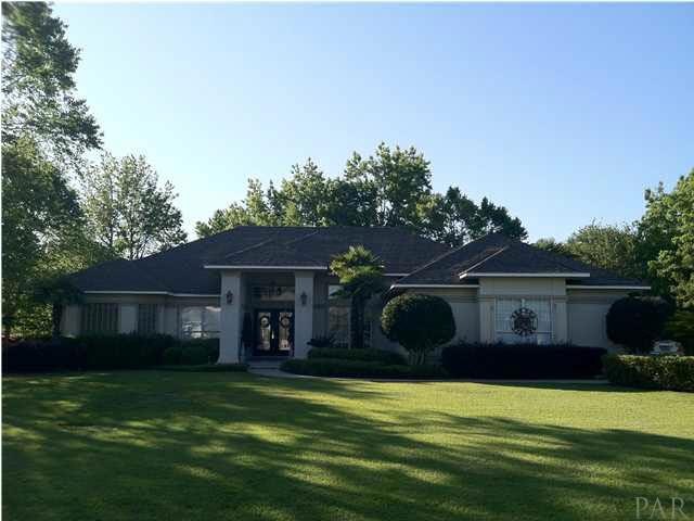 Beautiful curb appeal with lots of shrubery.