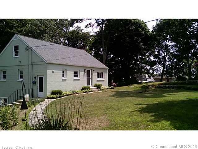 Exterior Front. Extra Large Lot. ALmost half an ac