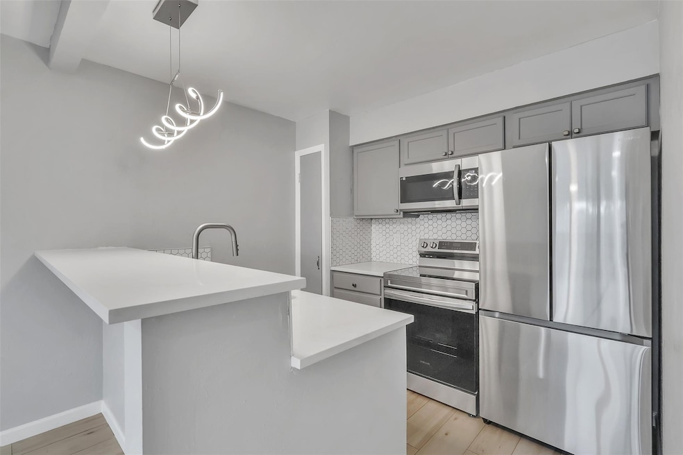 Kitchen featuring light hardwood / wood-style floo