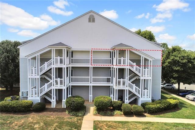Exterior view of the condo building. Condo outline
