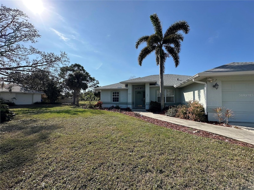 Front of house, double lot with xtra single car garage