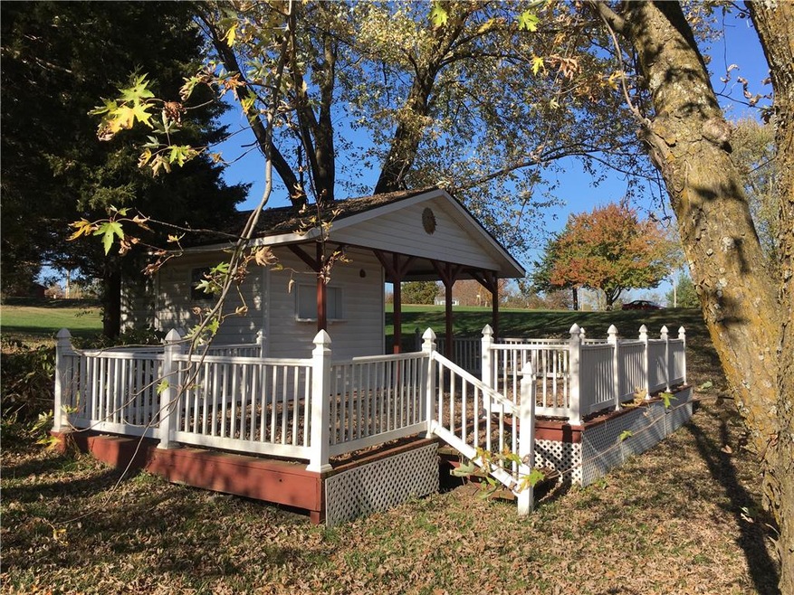 side view of gazebo w/ covered and uncovered area