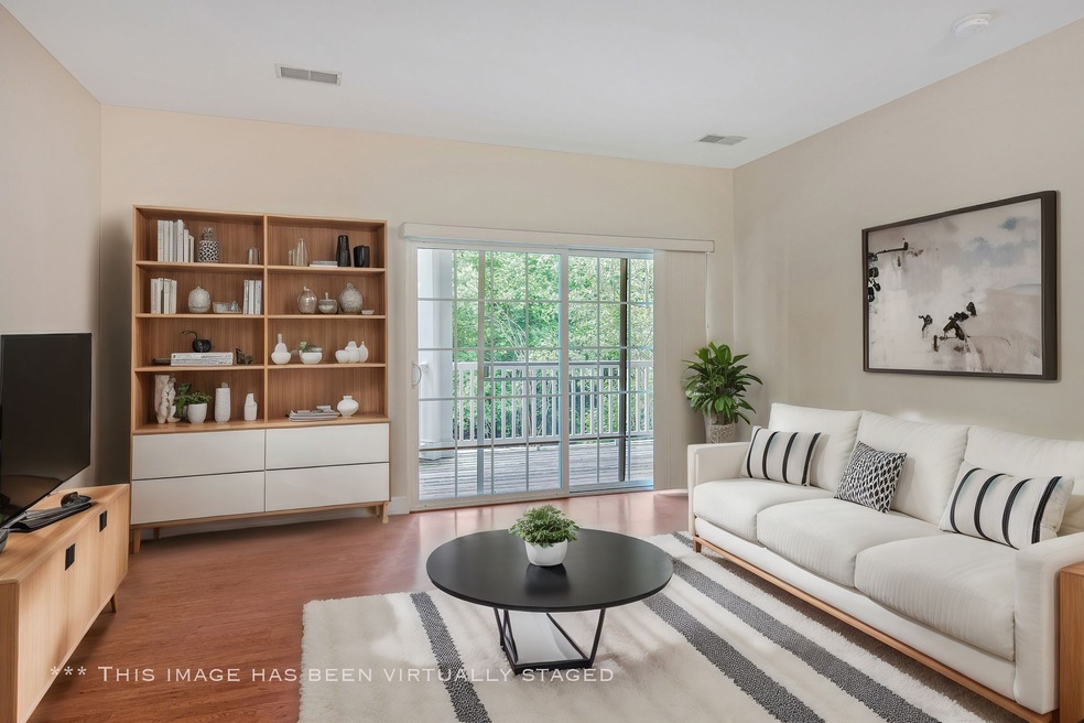 Lots of natural light floods the living room.