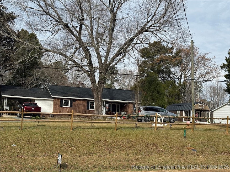 1411 Deep River Rd, Sanford, NC 27330 - photo 1