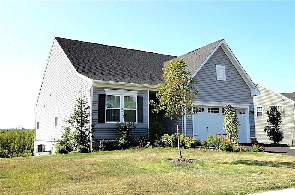 Professionally landscaped front yard.