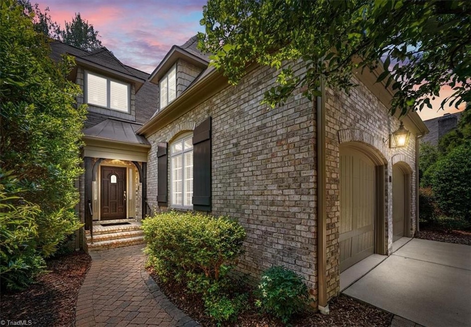 ENTRANCE/2 CAR GARAGE.